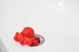 Toy Octopus in Drain