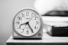 Alarm clock on side table