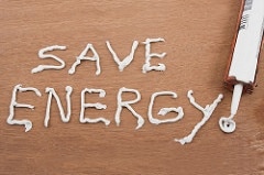 Words Save Energy written in Caulk
