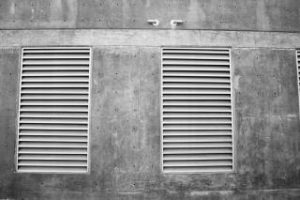 Gray Image of a Wall with ventilation system