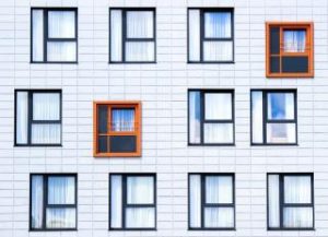 Abstract View of Windows on a Building, two red