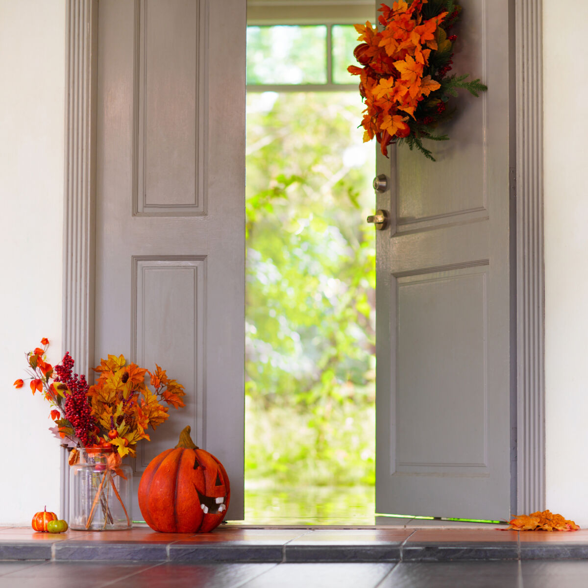 Home entrance. Halloween decoration on front door.